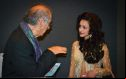 . Sikandar Sinha gestures hypnotically during discussion with enchanted actress Madhuri Bhattacharya